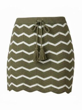 Green and white crochet mini skirt with tassel detail